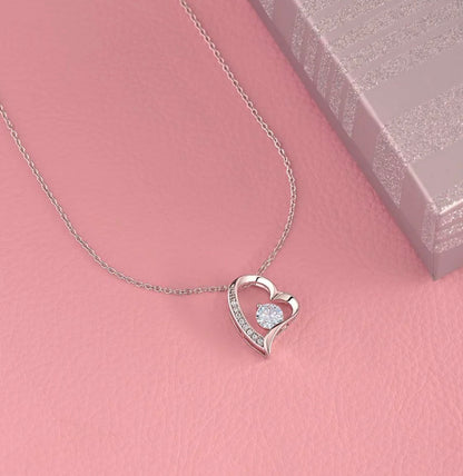 Mom's heart-shaped necklace in the light box
