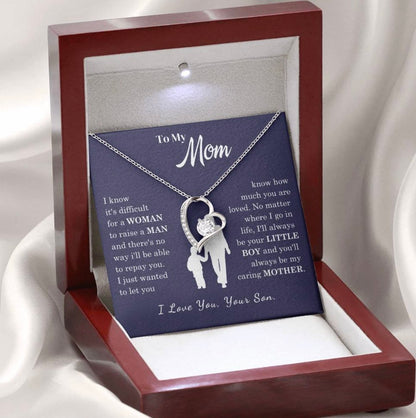 Mom's heart-shaped necklace in the light box
